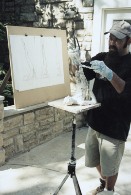 Applying cement saturated steel wool.